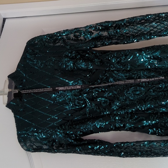 Emerald green sequin long sleeve tassel hem dress - Picture 2 of 4